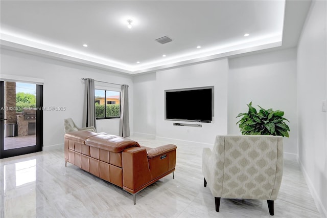 7970 SW 26th St, Miami, FL 33155 - living area featuring a tray ceiling, healthy amount of natural light, and recessed lighting