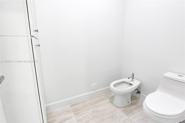 7970 SW 26th St, Miami, FL 33155 - bathroom featuring a bidet and toilet