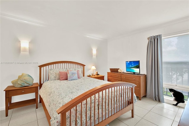 6886 N Kendall Dr Unit D102, Pinecrest, FL 33156 - bedroom with crown molding and light tile patterned floors