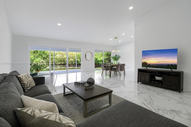 4808 Mango Dr, Tamarac, FL 33319 - living room with light marble finish flooring and recessed lighting