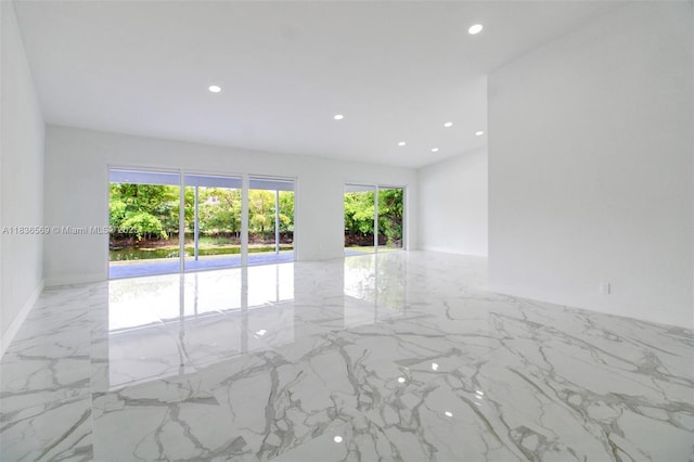 4808 Mango Dr, Tamarac, FL 33319 - spare room featuring marble tiled floors and recessed lighting