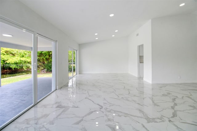 4808 Mango Dr, Tamarac, FL 33319 - unfurnished room featuring recessed lighting and marble finish floors