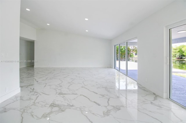 4808 Mango Dr, Tamarac, FL 33319 - empty room featuring marble tiled flooring and recessed lighting