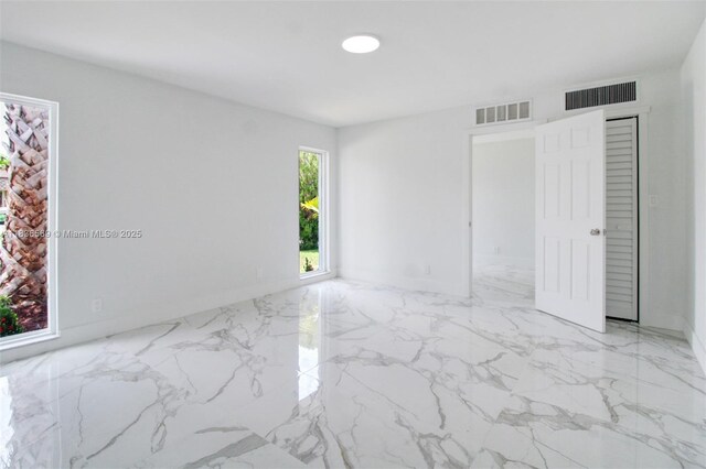 4808 Mango Dr, Tamarac, FL 33319 - empty room with marble tiled flooring