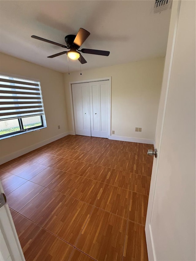 1061 NW 128th Ave, Miami, FL 33182 - unfurnished bedroom with ceiling fan and a closet