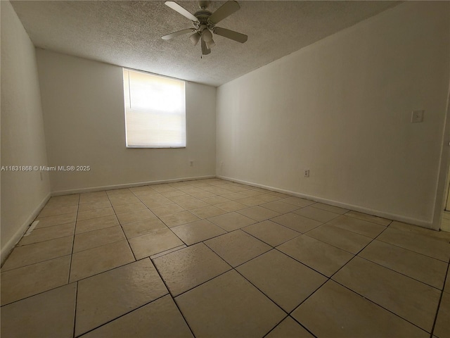 1750 NW 55th Ave Unit 103, Lauderhill, FL 33313 - unfurnished room featuring ceiling fan, a textured ceiling, and light tile patterned floors