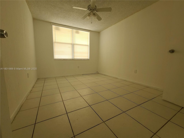 1750 NW 55th Ave Unit 103, Lauderhill, FL 33313 - spare room with a textured ceiling, ceiling fan, and light tile patterned floors