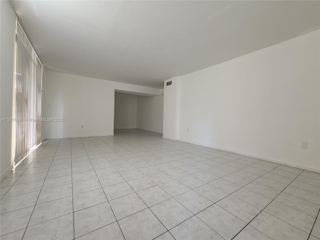 1750 NW 55th Ave Unit 103, Lauderhill, FL 33313 - empty room featuring light tile patterned flooring