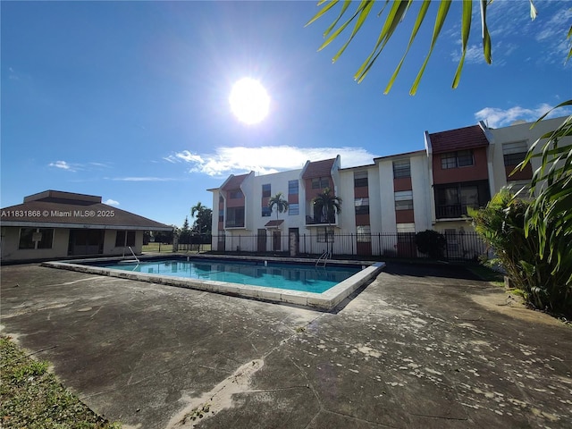 1750 NW 55th Ave Unit 103, Lauderhill, FL 33313 - community pool with a patio