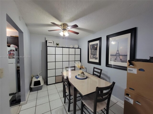 1796 NW 55th Ave Unit 103, Lauderhill, FL 33313 - dining room with a ceiling fan, a textured ceiling, and light tile patterned flooring