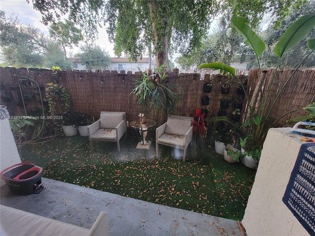 1796 NW 55th Ave Unit 103, Lauderhill, FL 33313 - fenced backyard with a patio
