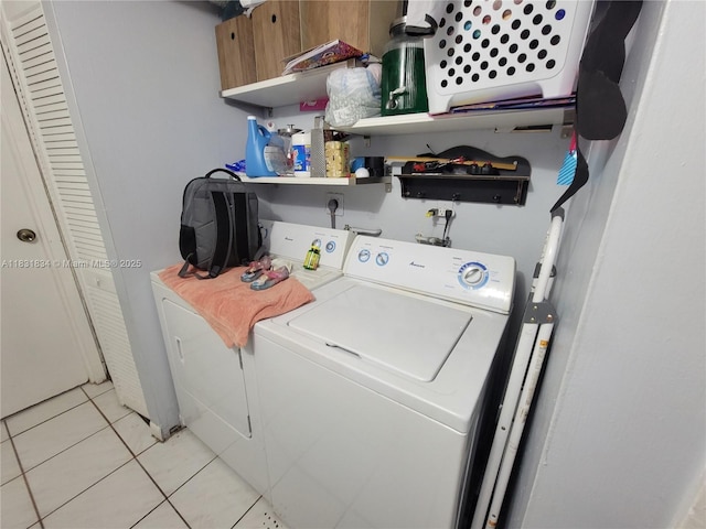 1796 NW 55th Ave Unit 103, Lauderhill, FL 33313 - washroom featuring washer and dryer and light tile patterned flooring