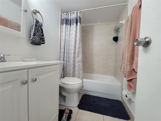 1796 NW 55th Ave Unit 103, Lauderhill, FL 33313 - full bathroom with vanity, tile patterned floors, and shower / bath combo with shower curtain