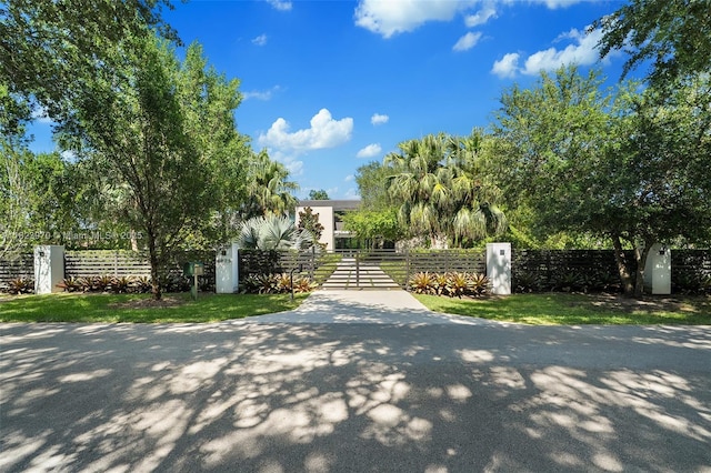 8875 SW 61st Ct, Pinecrest, FL 33156 - gate with a fenced front yard