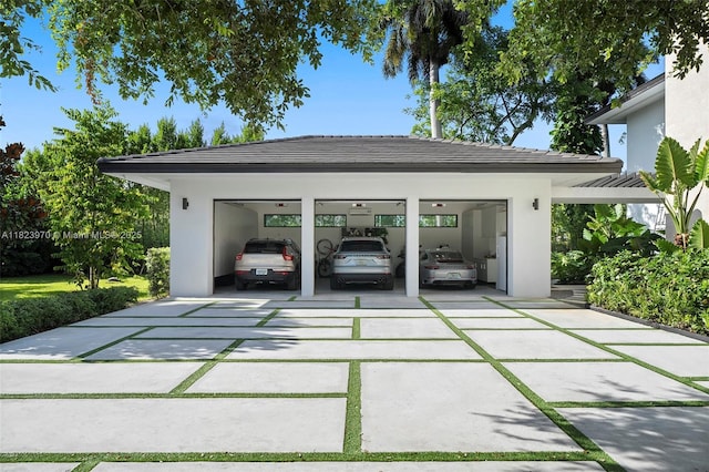 8875 SW 61st Ct, Pinecrest, FL 33156 - view of parking / parking lot featuring a garage and concrete driveway