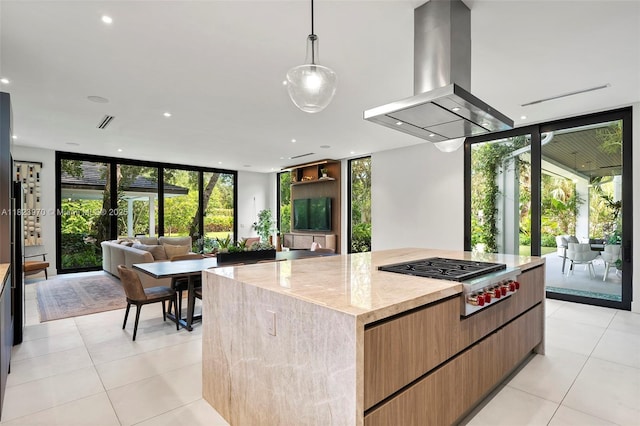 8875 SW 61st Ct, Pinecrest, FL 33156 - kitchen featuring stainless steel gas stovetop, island range hood, expansive windows, modern cabinets, and open floor plan