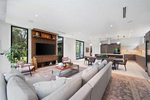 8875 SW 61st Ct, Pinecrest, FL 33156 - living room featuring recessed lighting and light tile patterned floors