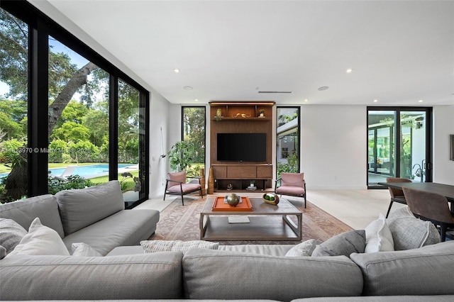 8875 SW 61st Ct, Pinecrest, FL 33156 - living room with expansive windows, plenty of natural light, and recessed lighting