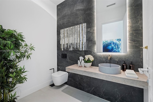 8875 SW 61st Ct, Pinecrest, FL 33156 - bathroom with tile walls and tile patterned flooring