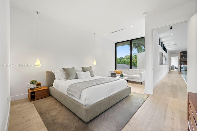 8875 SW 61st Ct, Pinecrest, FL 33156 - bedroom featuring light wood finished floors and recessed lighting
