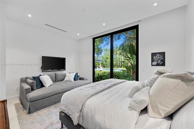 8875 SW 61st Ct, Pinecrest, FL 33156 - bedroom with recessed lighting, a wall of windows, and wood finished floors