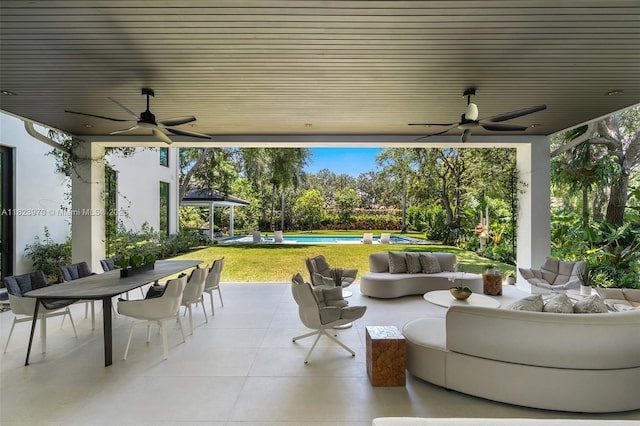 8875 SW 61st Ct, Pinecrest, FL 33156 - view of patio featuring ceiling fan, outdoor dining space, an outdoor hangout area, and a gazebo