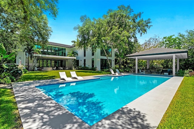 8875 SW 61st Ct, Pinecrest, FL 33156 - outdoor pool featuring a gazebo, a yard, a patio area, and an outdoor hangout area
