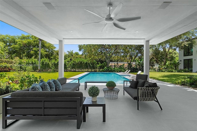 8875 SW 61st Ct, Pinecrest, FL 33156 - swimming pool featuring an outdoor hangout area, ceiling fan, a patio, and a lawn