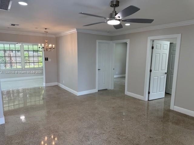917 SE 15th Ct, Deerfield Beach, FL 33441 - unfurnished room with a chandelier, ceiling fan, crown molding, speckled floor, and recessed lighting