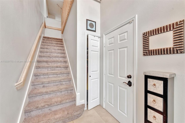 12442 NW 10th Ct Unit C-14, Coral Springs, FL 33071 - stairs featuring tile patterned floors and baseboards