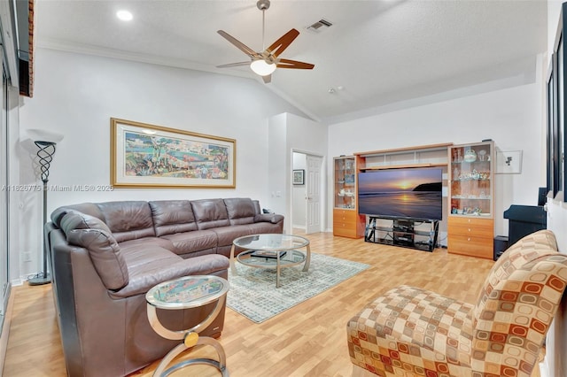 12442 NW 10th Ct Unit C-14, Coral Springs, FL 33071 - living room featuring vaulted ceiling, a ceiling fan, wood finished floors, crown molding, and recessed lighting