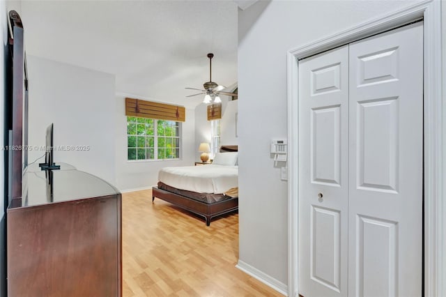 12442 NW 10th Ct Unit C-14, Coral Springs, FL 33071 - bedroom with light wood-style floors and a ceiling fan
