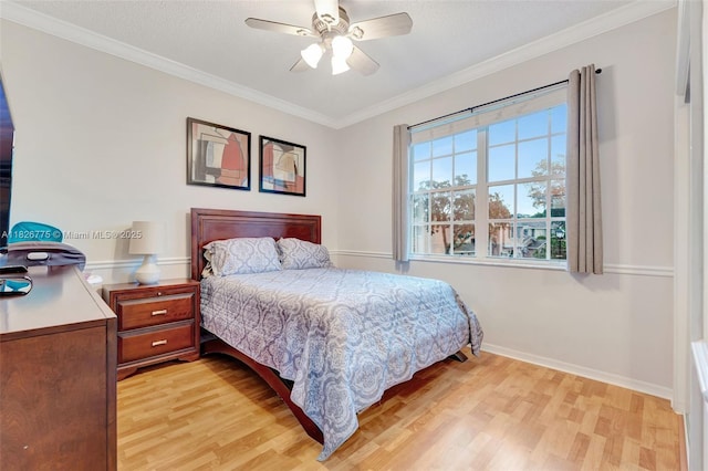 12442 NW 10th Ct Unit C-14, Coral Springs, FL 33071 - bedroom with light wood finished floors, ornamental molding, and a ceiling fan