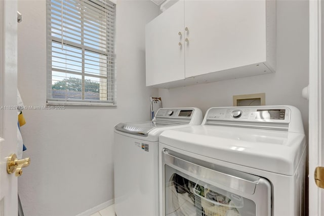 12442 NW 10th Ct Unit C-14, Coral Springs, FL 33071 - washroom featuring separate washer and dryer and cabinet space