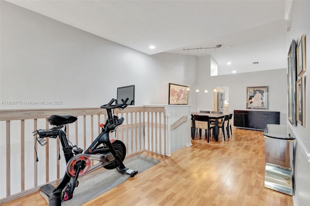 12442 NW 10th Ct Unit C-14, Coral Springs, FL 33071 - exercise area with arched walkways, wood finished floors, and recessed lighting