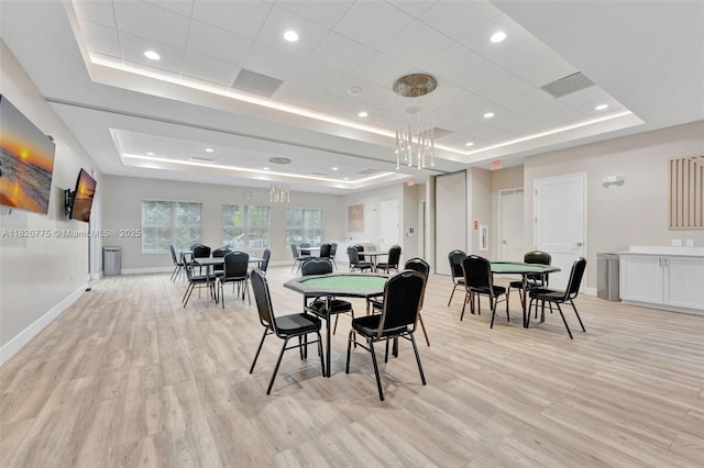 12442 NW 10th Ct Unit C-14, Coral Springs, FL 33071 - dining area with a raised ceiling, light wood-style floors, and recessed lighting