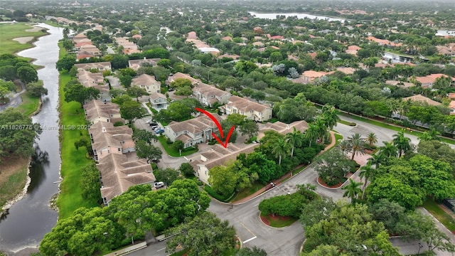 12442 NW 10th Ct Unit C-14, Coral Springs, FL 33071 - aerial view of property and surrounding area with a large body of water and nearby suburban area