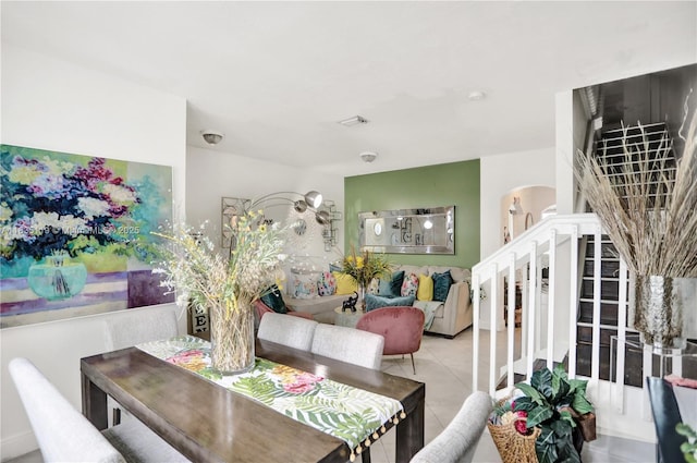 4292 SW 156th Ave Unit 154, Miramar, FL 33027 - tiled dining room with arched walkways and stairs