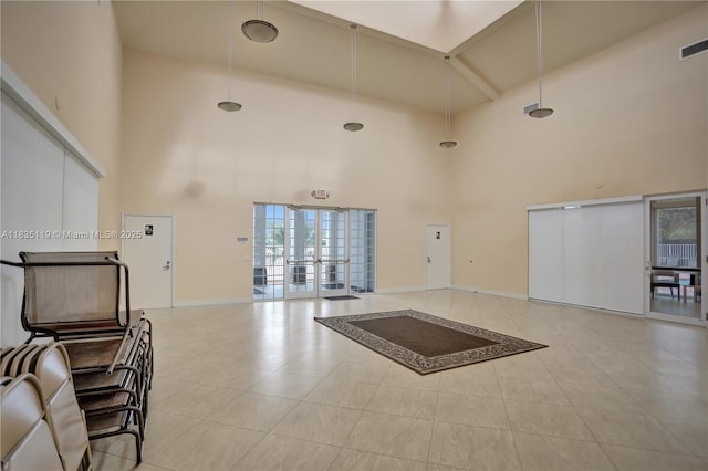 4292 SW 156th Ave Unit 154, Miramar, FL 33027 - common area featuring a high ceiling and beam ceiling