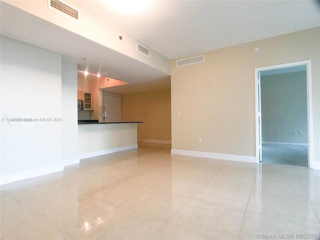 951 Brickell Ave Unit 2405, Miami, FL 33131 - unfurnished room featuring light tile patterned flooring and baseboards