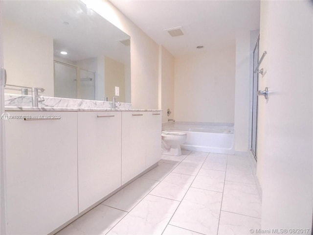 951 Brickell Ave Unit 2405, Miami, FL 33131 - full bathroom with double vanity, a bath, a stall shower, and marble finish flooring