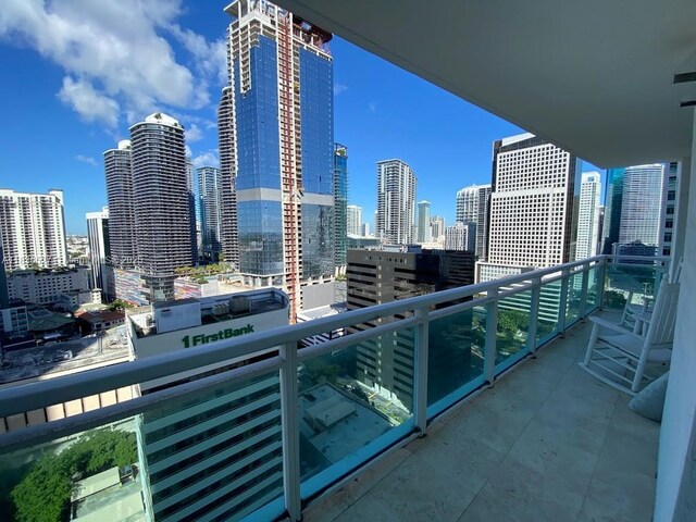 951 Brickell Ave Unit 2405, Miami, FL 33131 - balcony featuring a view of skyline