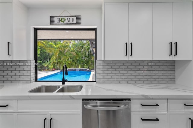 11965 SW 15th Ct, Davie, FL 33325 - kitchen featuring dishwasher and white cabinetry