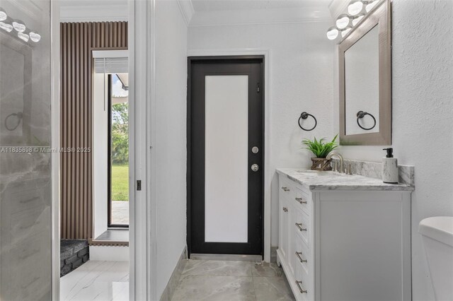 11965 SW 15th Ct, Davie, FL 33325 - bathroom featuring vanity, ornamental molding, and marble look tiles