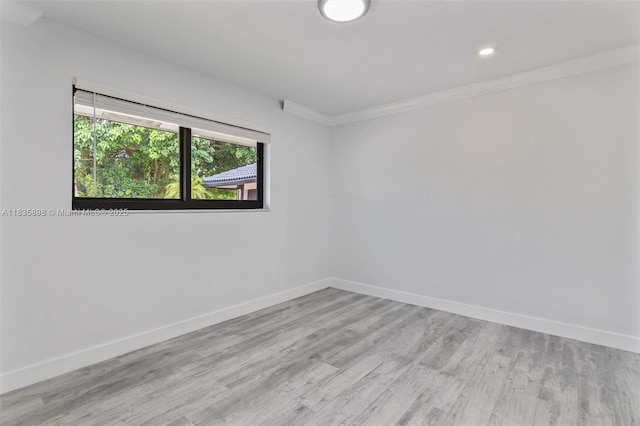 11965 SW 15th Ct, Davie, FL 33325 - spare room with light wood-type flooring, crown molding, and recessed lighting