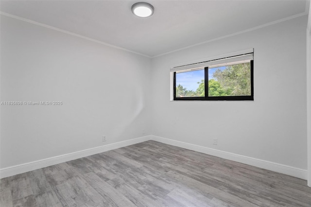 11965 SW 15th Ct, Davie, FL 33325 - empty room featuring crown molding and wood finished floors