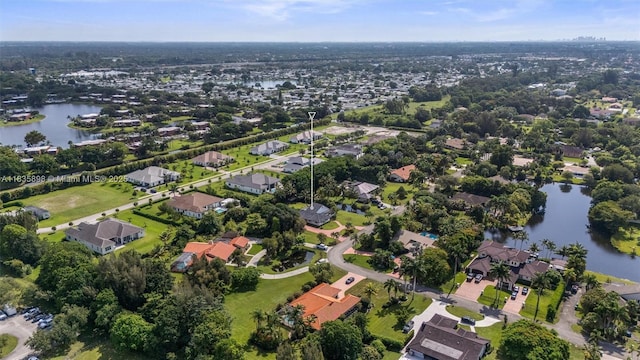 11965 SW 15th Ct, Davie, FL 33325 - aerial view of property's location featuring a nearby body of water and nearby suburban area