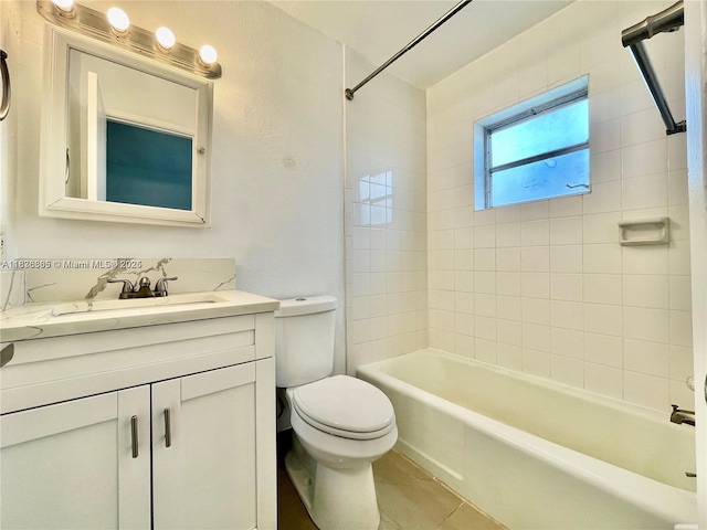 241 SE 9th Ave Unit 207, Pompano Beach, FL 33060 - full bathroom featuring vanity, shower / bath combination, and tile patterned flooring