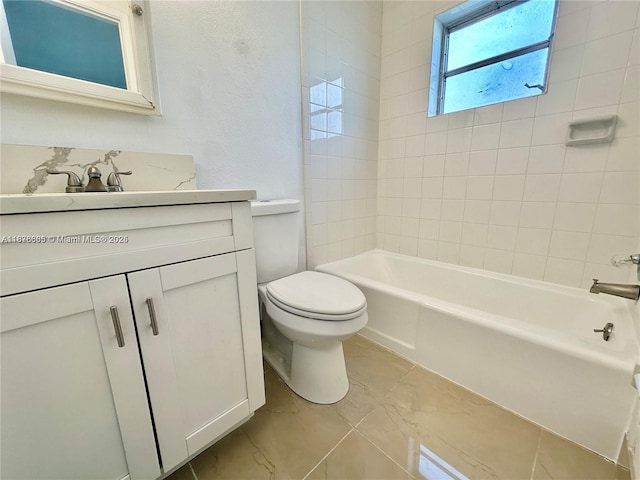 241 SE 9th Ave Unit 207, Pompano Beach, FL 33060 - full bathroom with vanity, marble finish floors, and bathing tub / shower combination