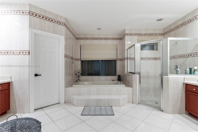 12530 SW 96th Ct, Miami, FL 33176 - bathroom with vanity, tile walls, a garden tub, tile patterned floors, and a shower stall